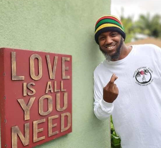 #LOVENOFEAR Book Series Author Barak Bomani by a sign #LOVENOFEAR Book Series Author Barak Bomani by a sign